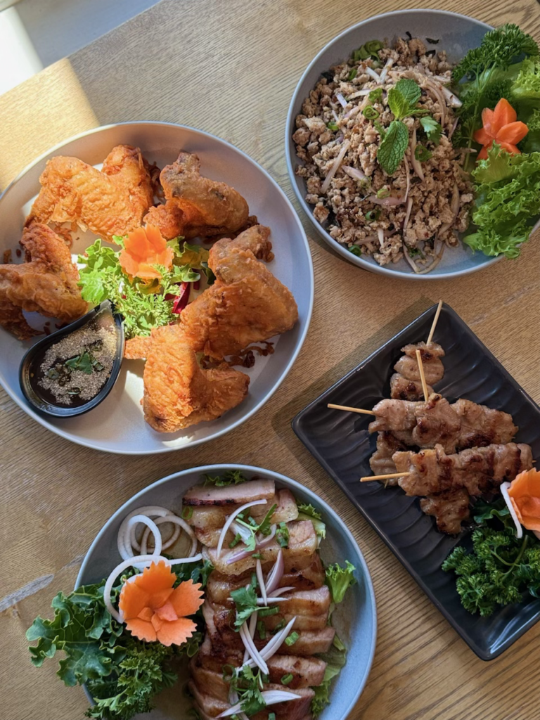 A spread of dishes on a table at Bai Bua Thai Cuisine